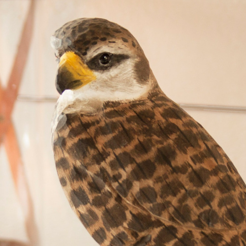Wildlife Garden wood-carved bird - peregrine falcon