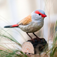 Wildlife Garden wood-carved bird - black-and-white firebird