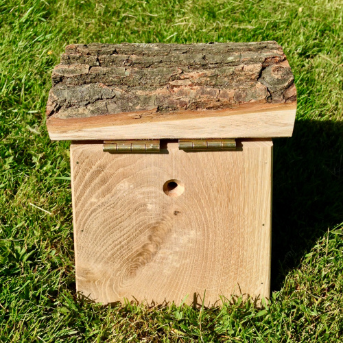 Hercules teat box with bark roof